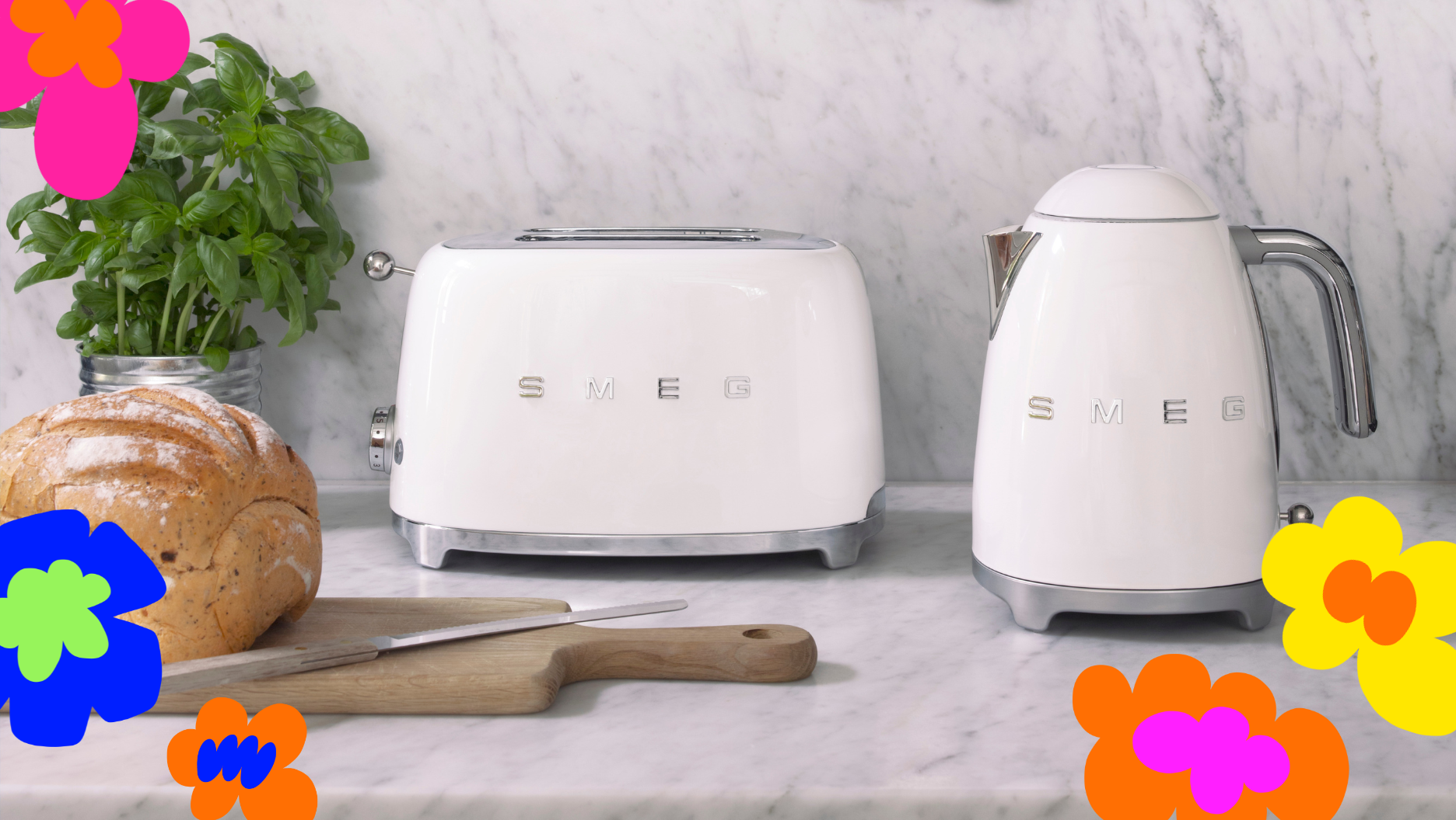 White Smeg kettle, toaster and bread on a kitchen bench